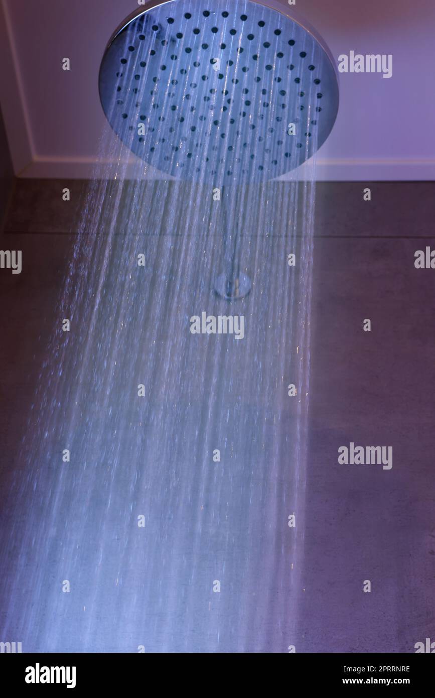 Luxury shower with water flowing in bathroom Stock Photo Alamy