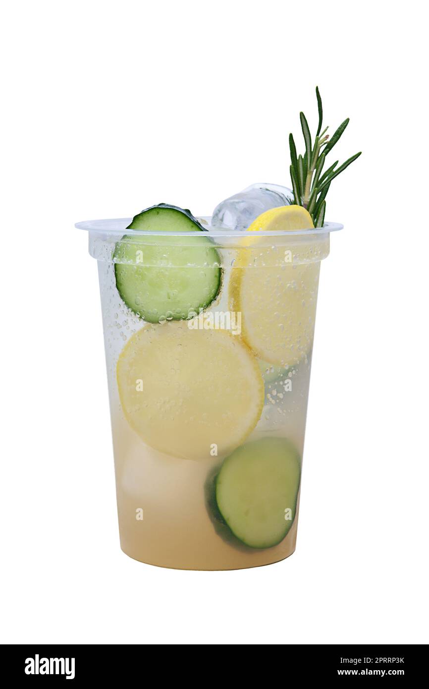 Cucumber and lemon lemonade in plastic take away glass Stock Photo