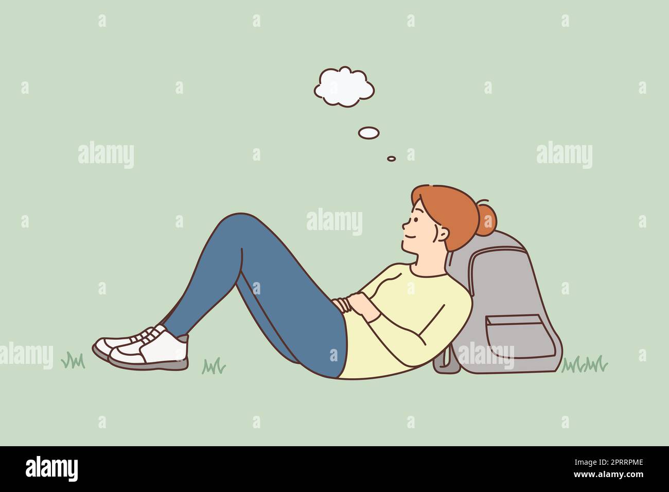 Happy young woman lying on ground dreaming or visualizing. Smiling girl ...