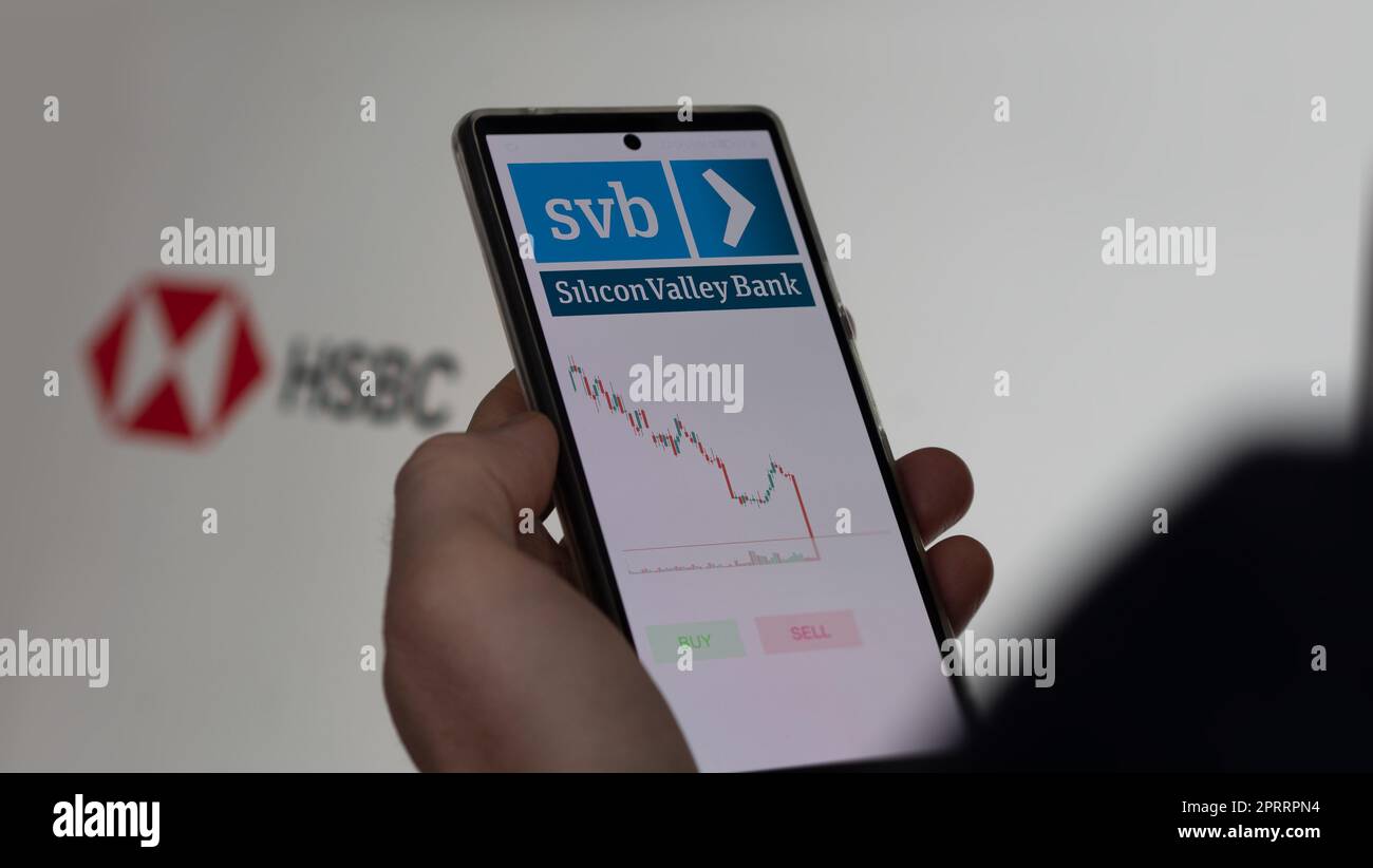 March 26th 2023. An investor analyzing the svb Silicon Valley Bank's ...