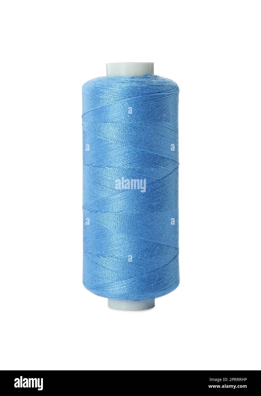 Spool of light blue sewing thread isolated on white Stock Photo - Alamy