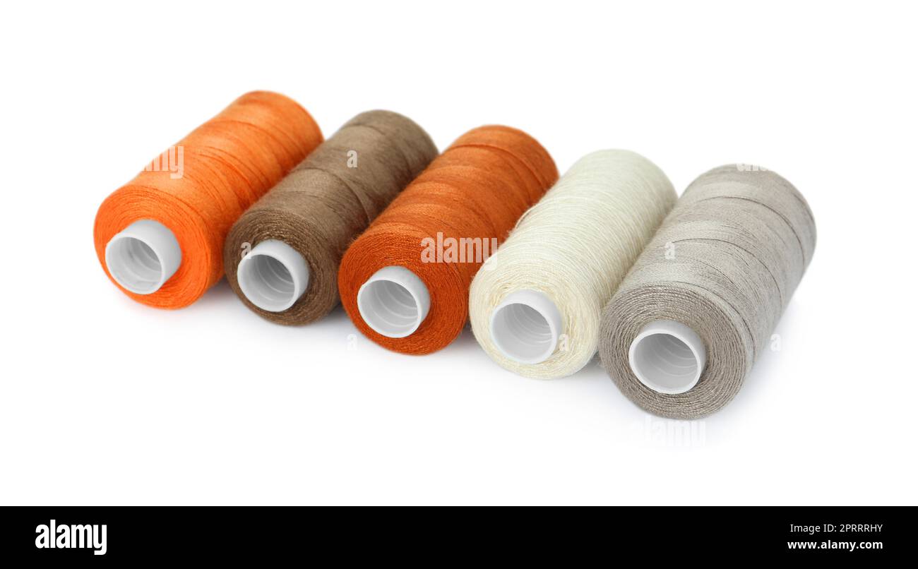 Set of different colorful sewing threads on white background Stock ...