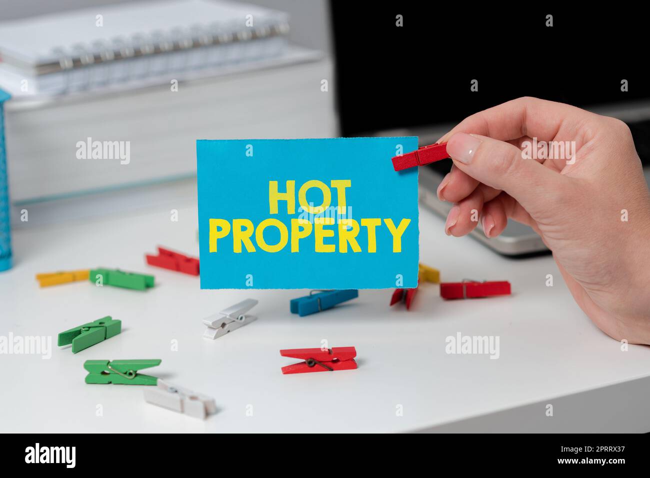 Text showing inspiration Hot Property. Internet Concept Something which is sought after or is Heavily Demanded Stock Photo
