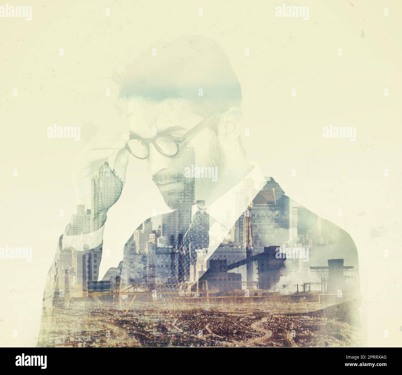 The thinking mans city. Composite image of a well-dressed man superimposed on an image of urban development. Stock Photo