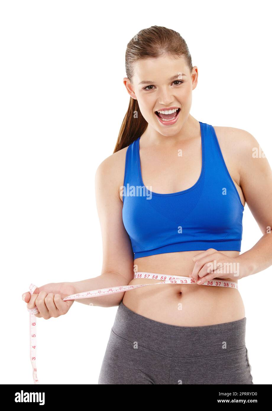 Its great seeing the results. A pretty teenage girl measuring her ...