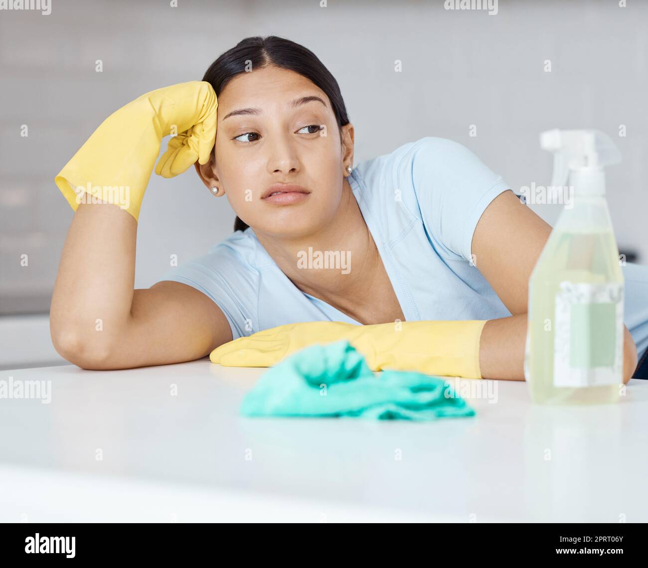 https://c8.alamy.com/comp/2PRT06Y/cleaning-covid-and-hygiene-with-a-bored-woman-cleaner-looking-at-a-spray-bottle-or-sanitizer-with-a-negative-expression-chores-clean-and-sanitizing-with-a-young-female-unhappy-about-housework-2PRT06Y.jpg