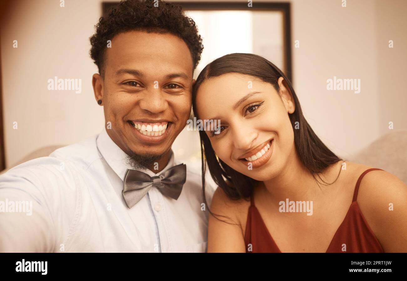 Couple love, happy to take selfie before date in formal fashion excited for party or dinner together. African man with woman smile in evening dress, going to work event or celebration at restaurant Stock Photo