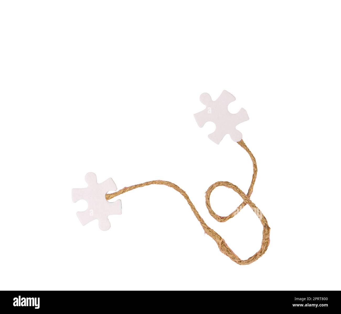 the connection with a string between two pieces of puzzle on a ...