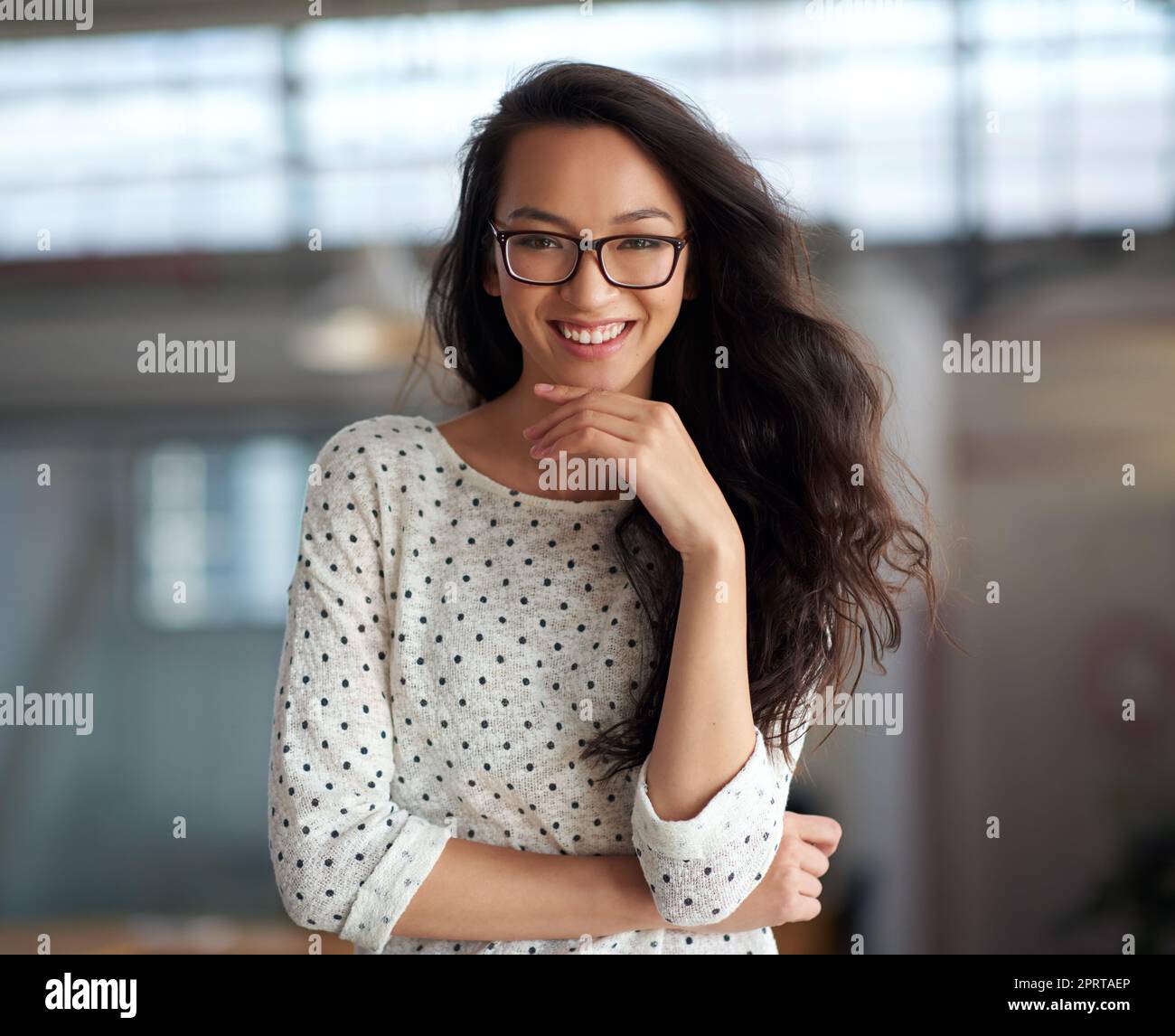 Creative Genius. Portrait of a vivacious young trendy woman in an industrial setting. Stock Photo