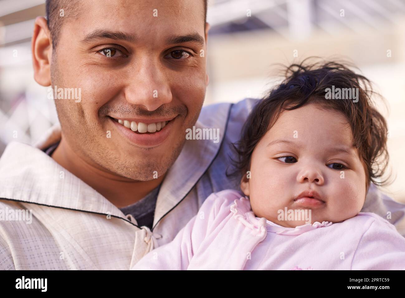 My little bundle of love and joy. a father cradling his little baby girl. Stock Photo