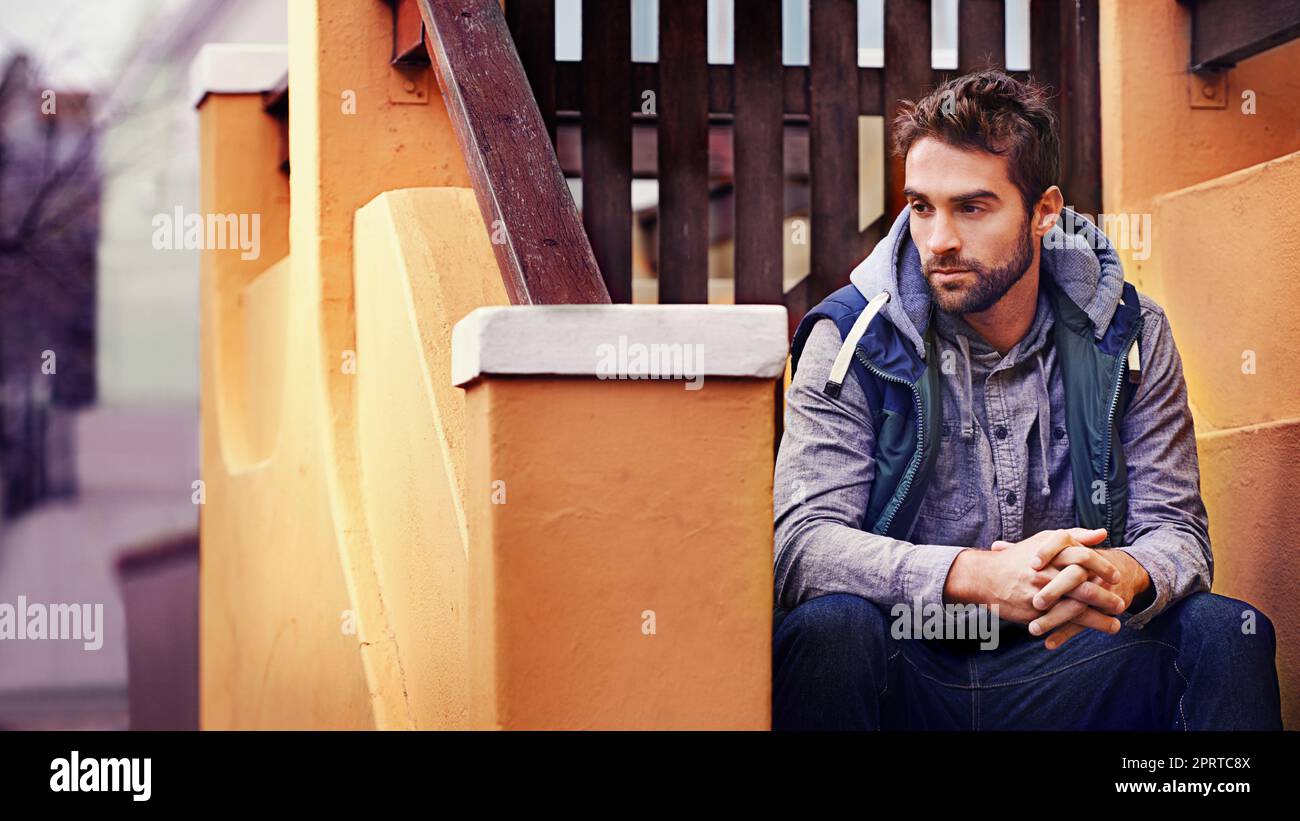 He can make any outfit work. A handsome young man in winter attire. Stock Photo