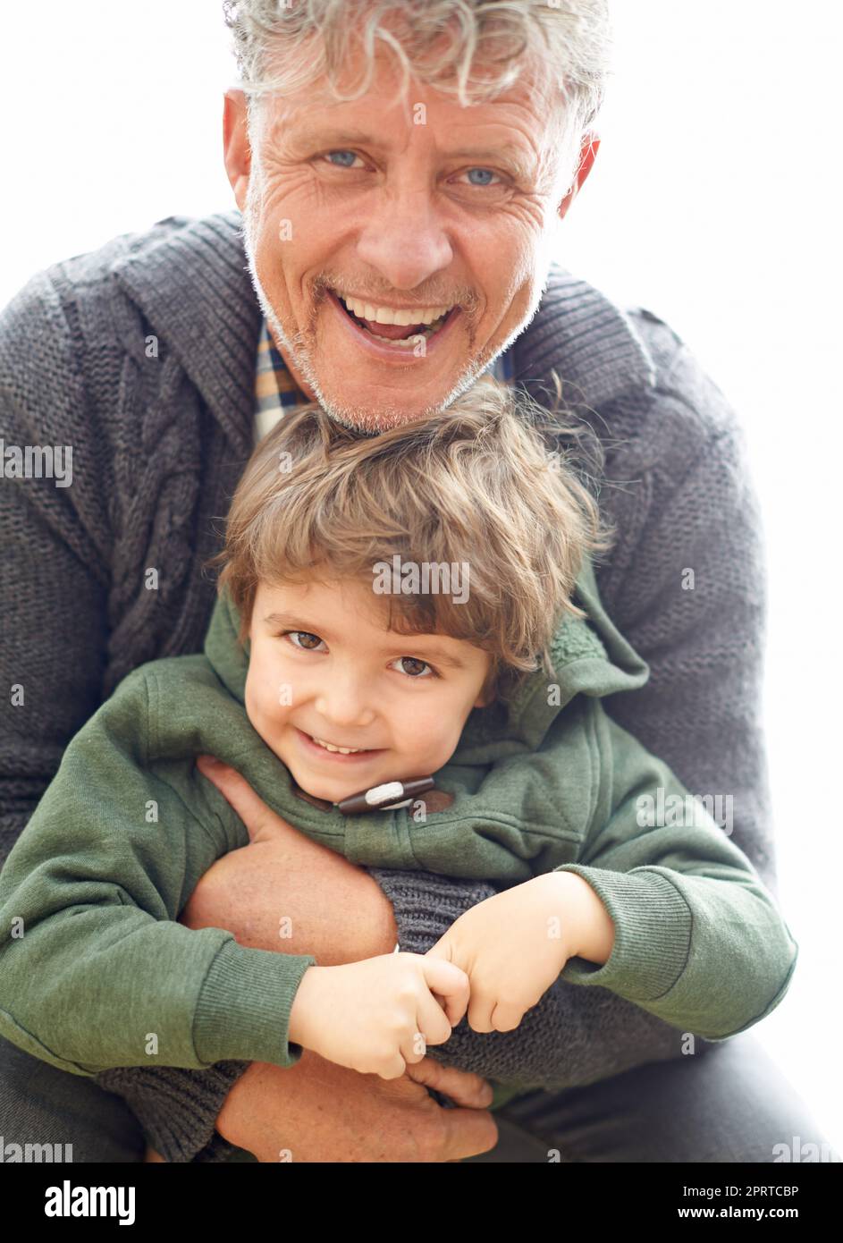 My grandad and best friend. a grandfather enjoying a day outside with his grandson. Stock Photo