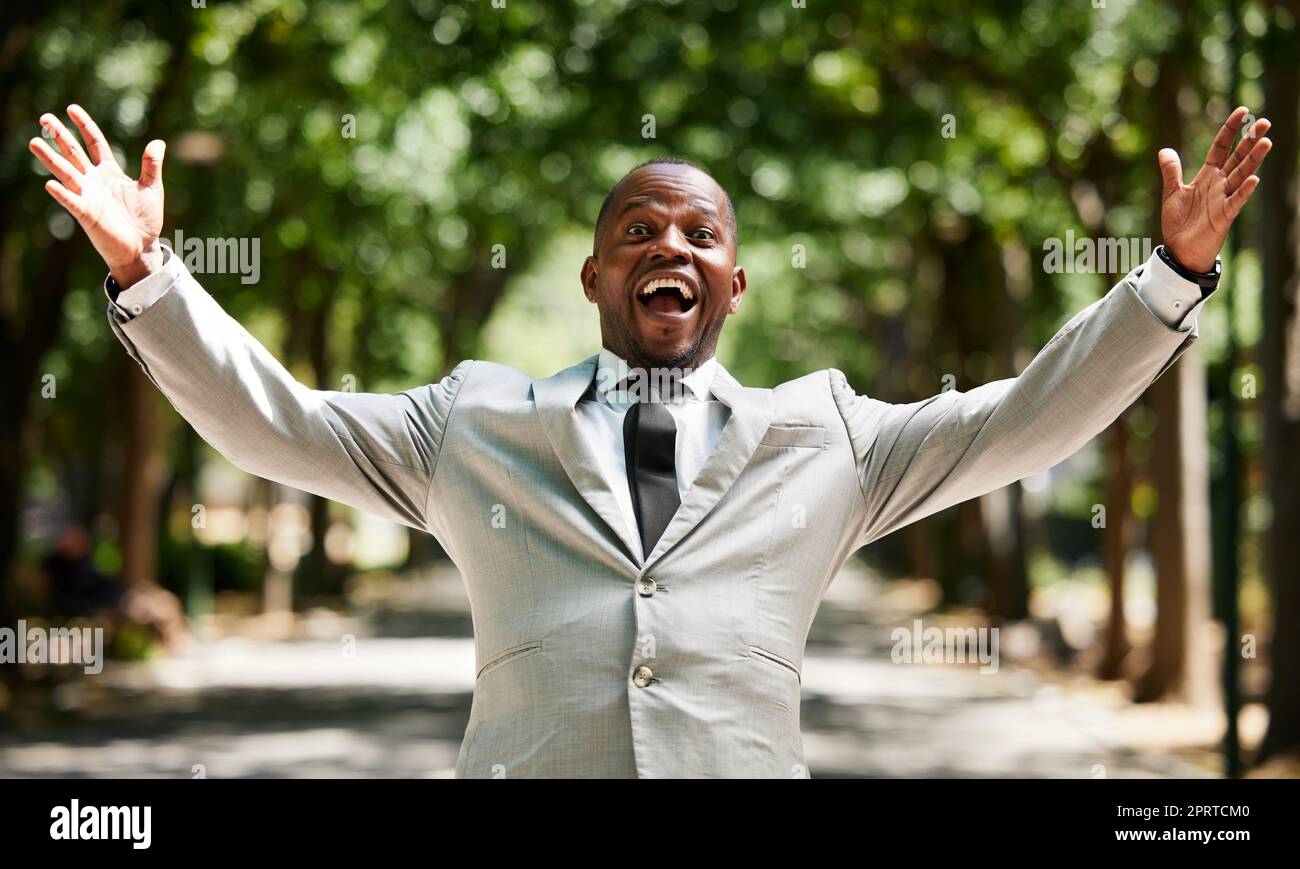 Excited businessman with success, winning and celebration portrait for bonus, achievement and career goal. Black man entrepreneur, corporate worker or professional winner celebrate sale and profit Stock Photo