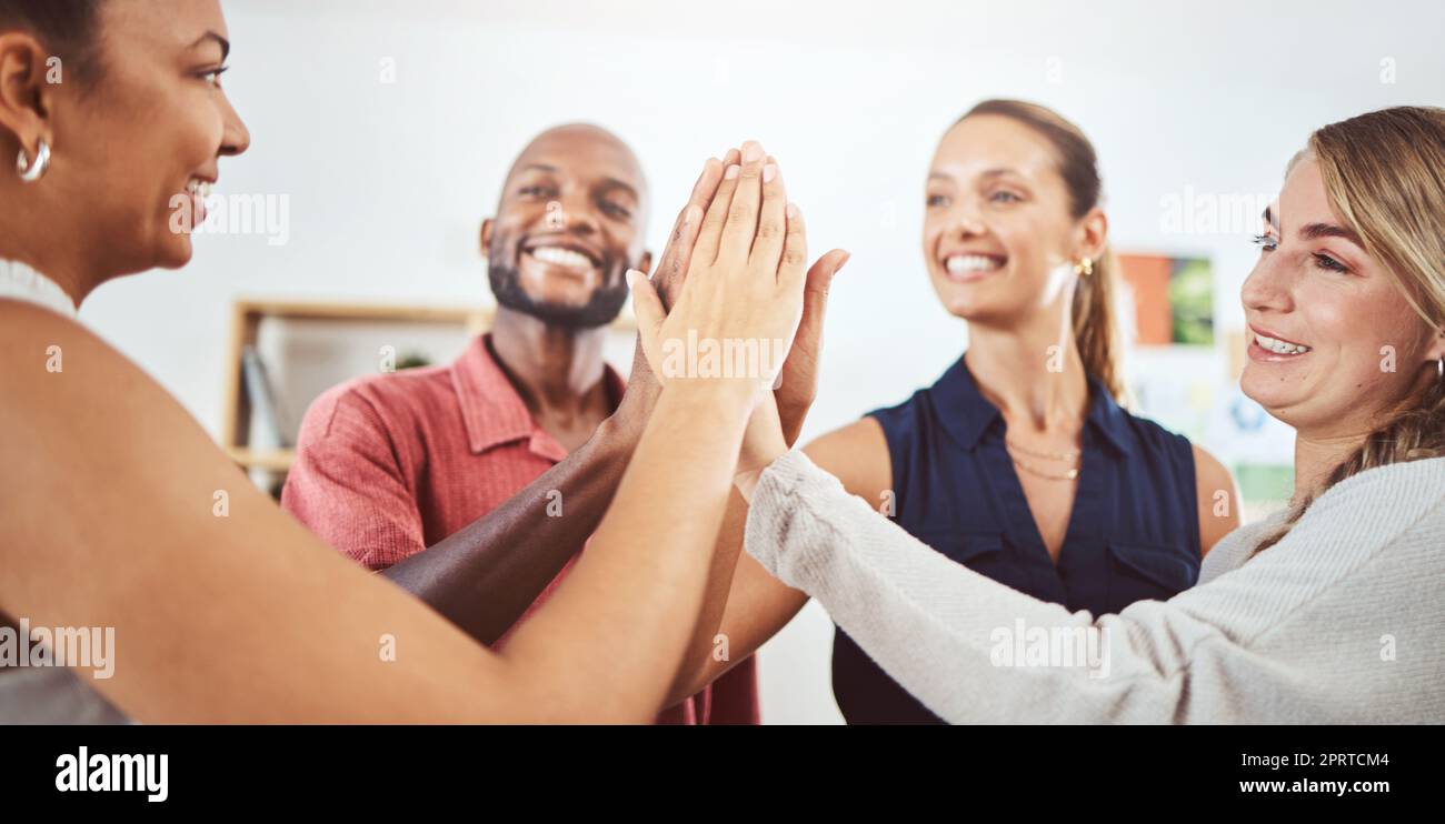High five, business teamwork and global success with black man, women and creative collaboration. Smile, happy and excited people, worker and employee in diversity office with b2b sales deal support Stock Photo