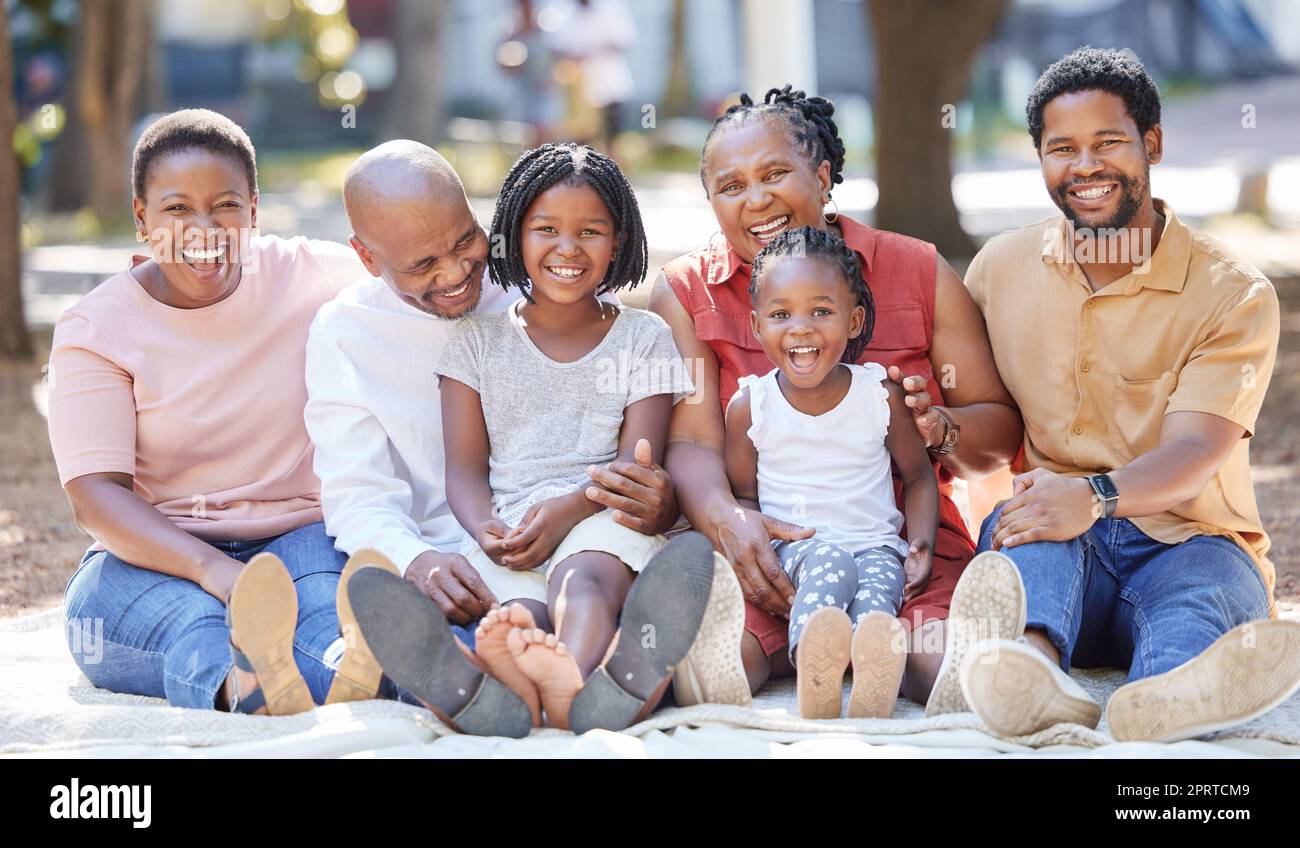 Generation of happy family, picnic in park and garden for summer in nature outdoors to relax, care and quality time together. Black people portrait of grandparents, parents and children enjoying day Stock Photo