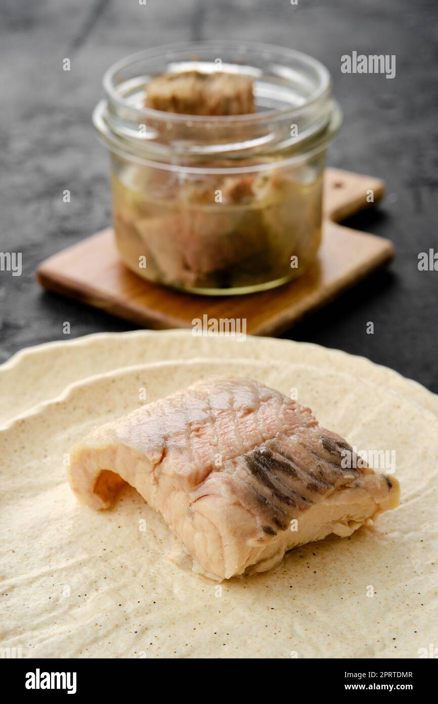 Closeup view of canned sturgeon on a plate. Stock Photo