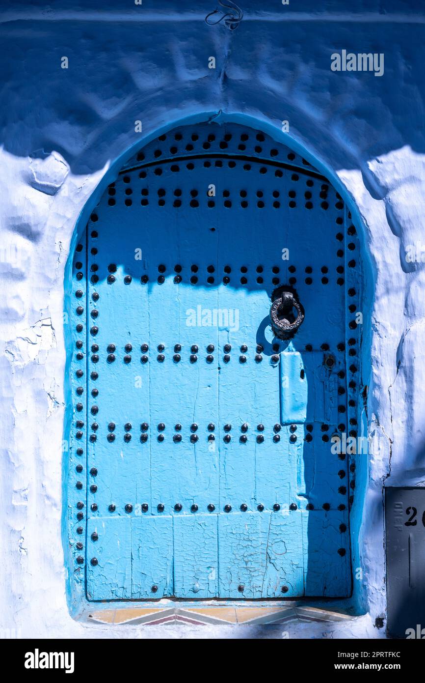 Door of a house in the blue streets of Chefchaouen. Stock Photo