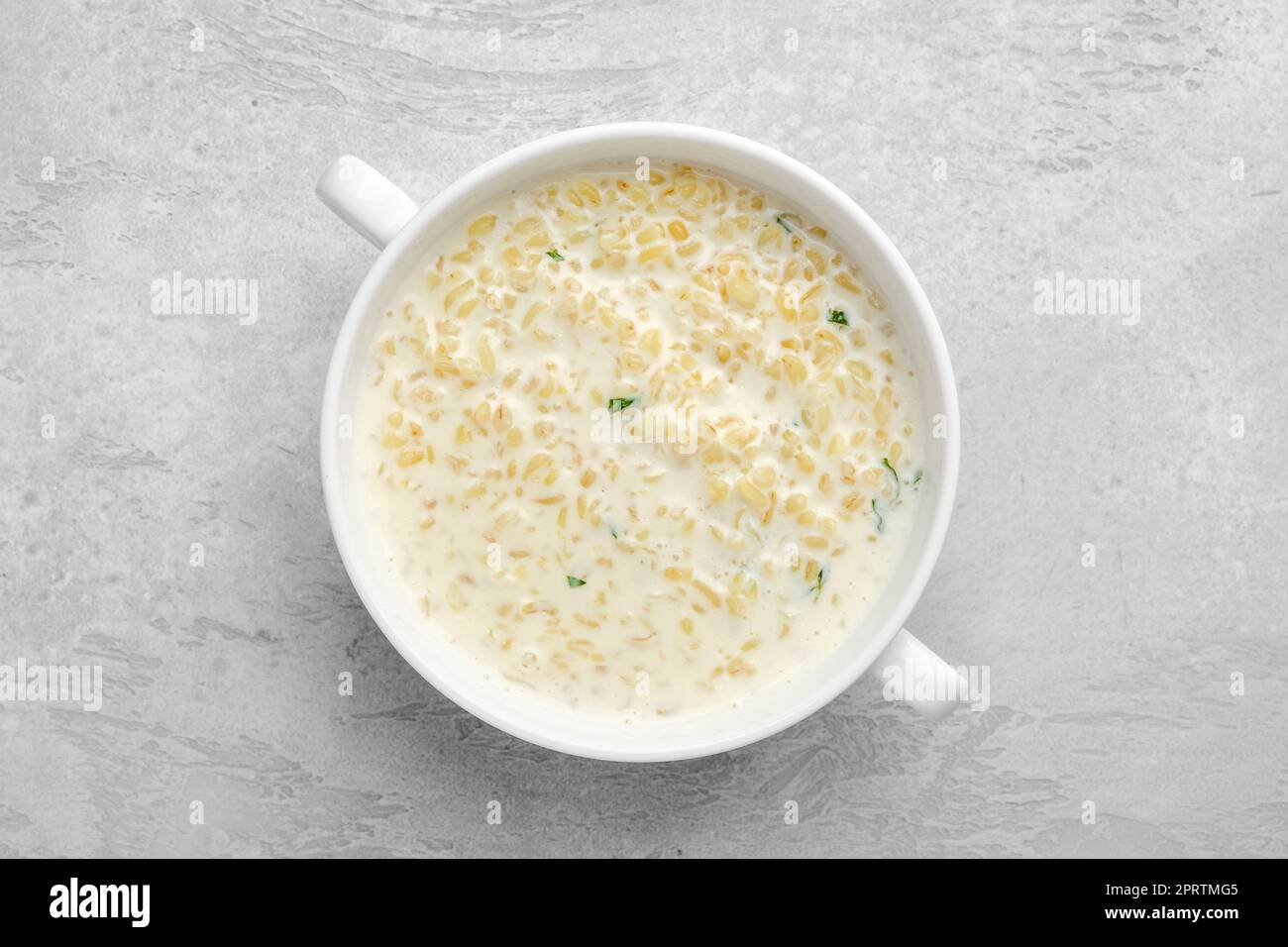 Overhead view of lean bulgur porridge in a bowl. Stock Photo