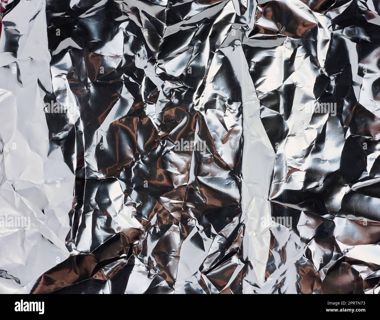 Crumpled gray foil sheet for food packaging, full frame Stock Photo Alamy