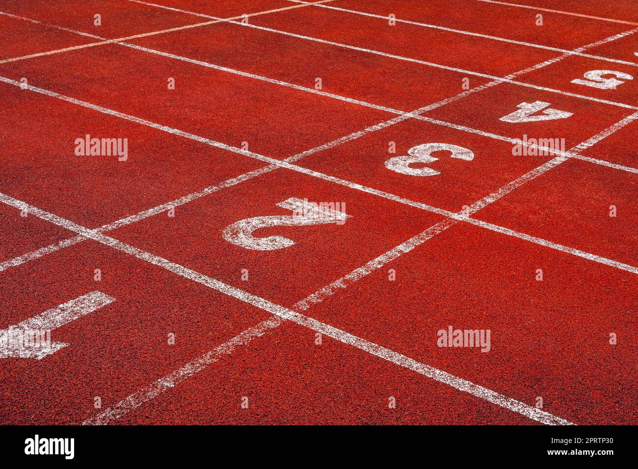 Start points with numbers on running track or athlete track in stadium Stock Photo