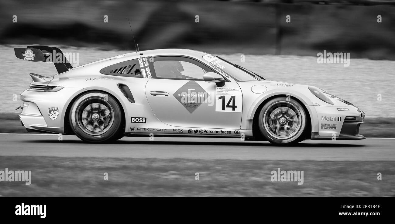 Black and white Image of a Porsche Carrera Racing Car Stock Photo