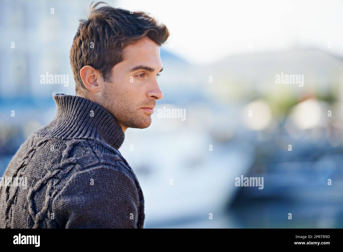 Soaking up the solitude. a handsome young man spending a day outdoors. Stock Photo