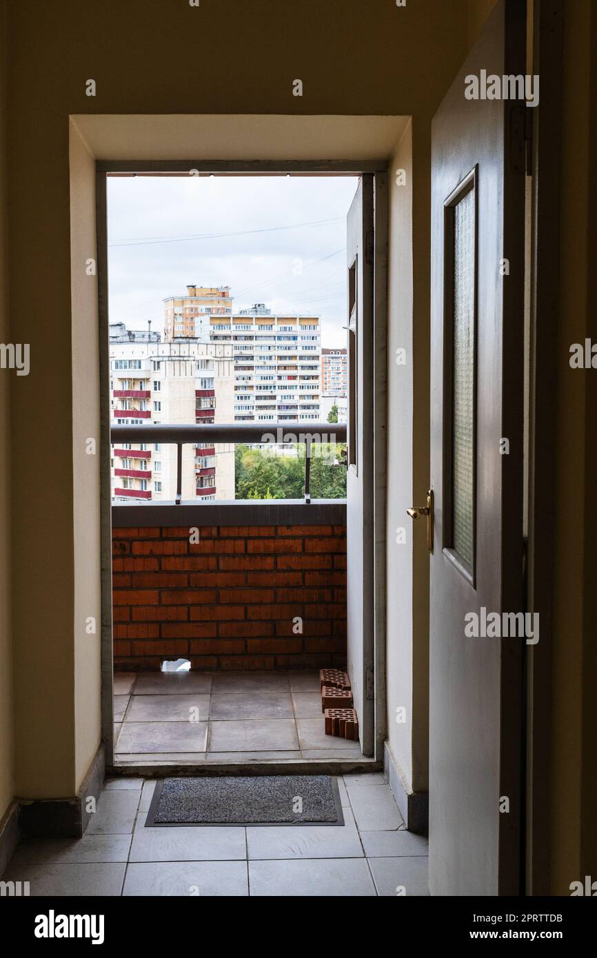 View of access to street balcony in city high-rise building Stock Photo - Alamy