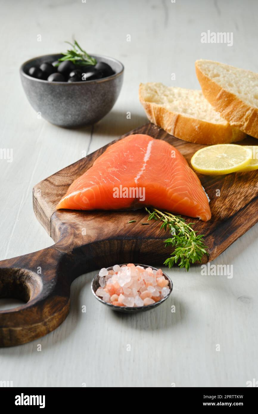 Piece of fresh salmon tail fillet Stock Photo Alamy