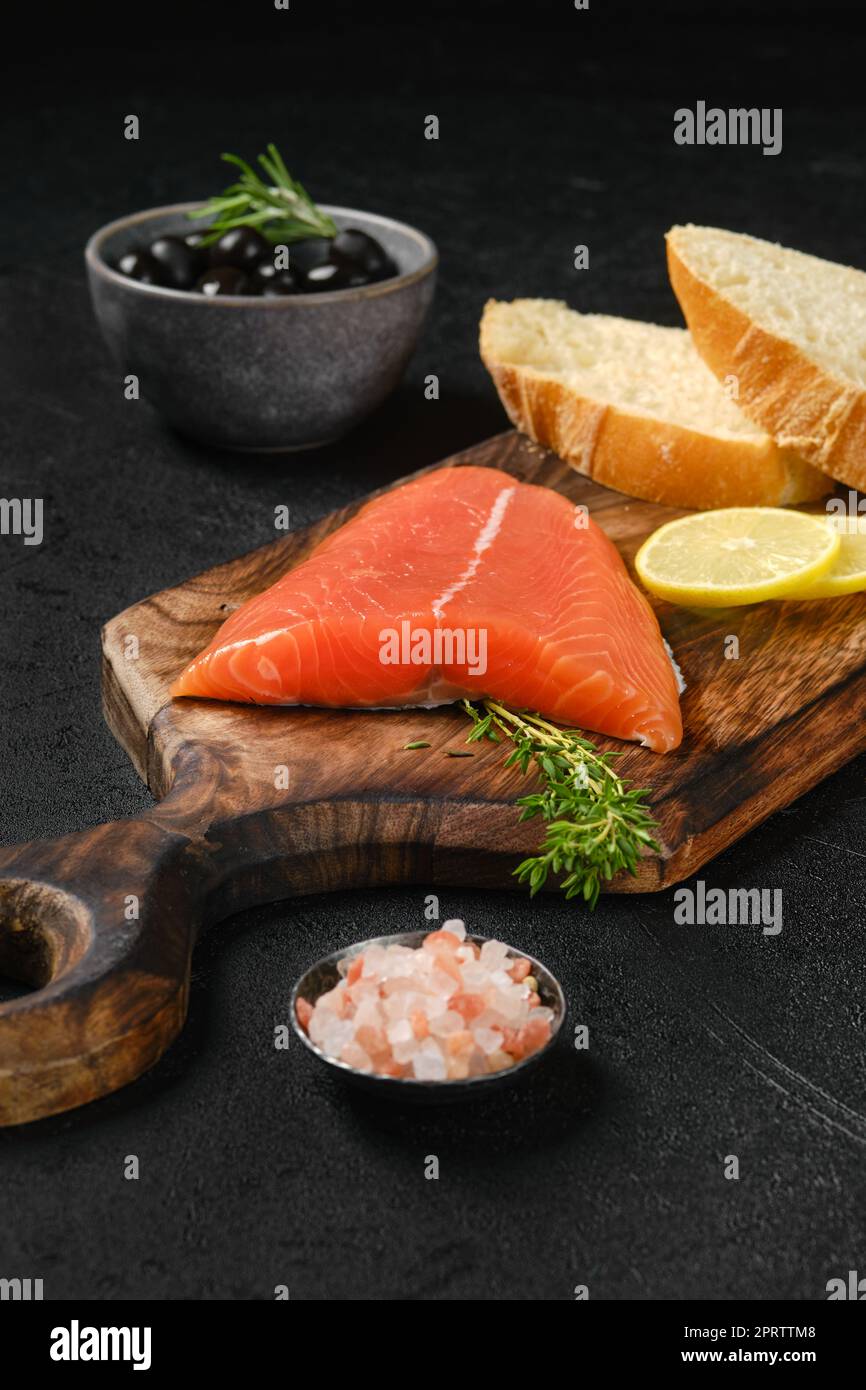 Piece of fresh salmon tail fillet Stock Photo Alamy