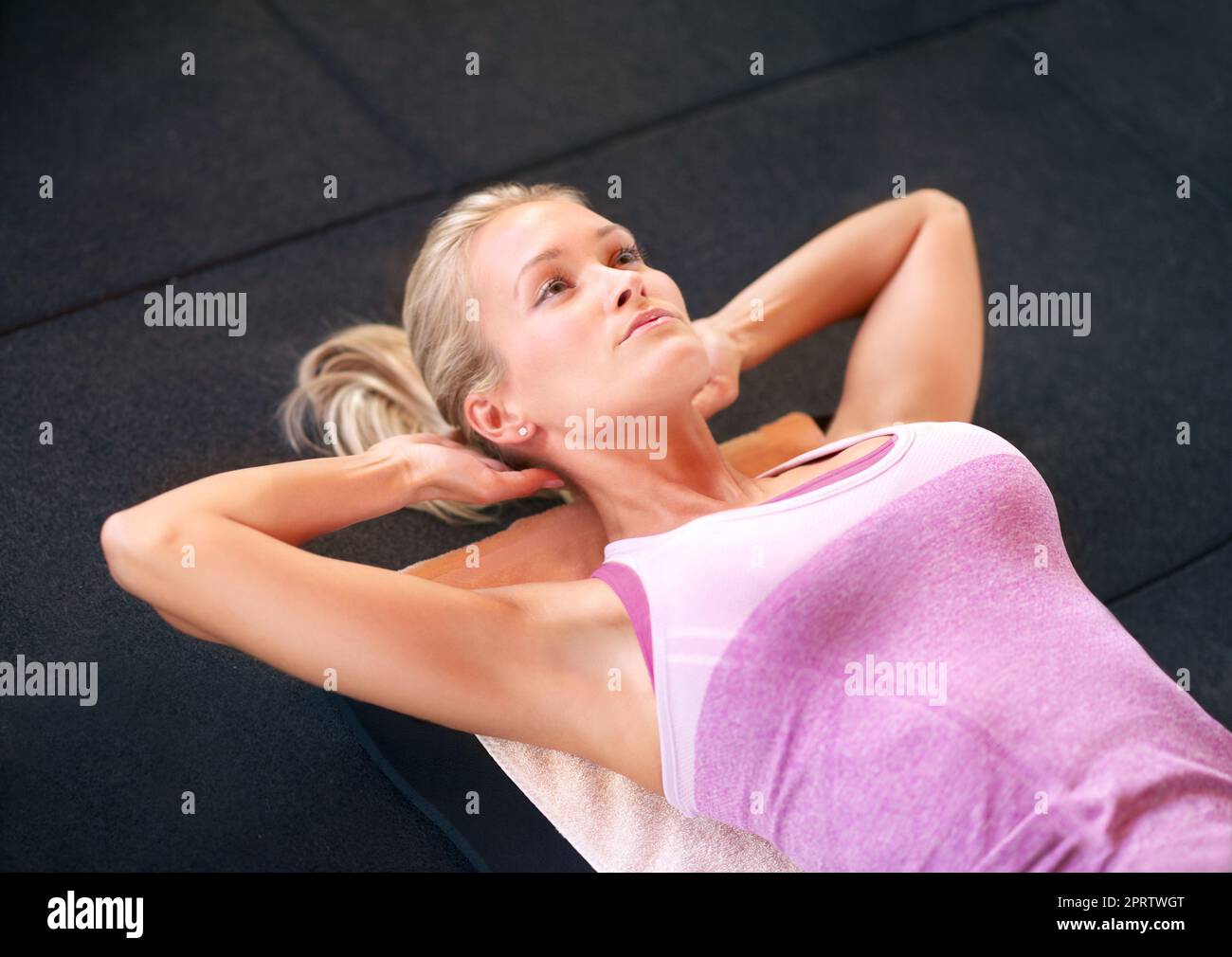 https://c8.alamy.com/comp/2PRTWGT/no-negative-thoughts-allowed-a-young-woman-lifting-weights-2PRTWGT.jpg