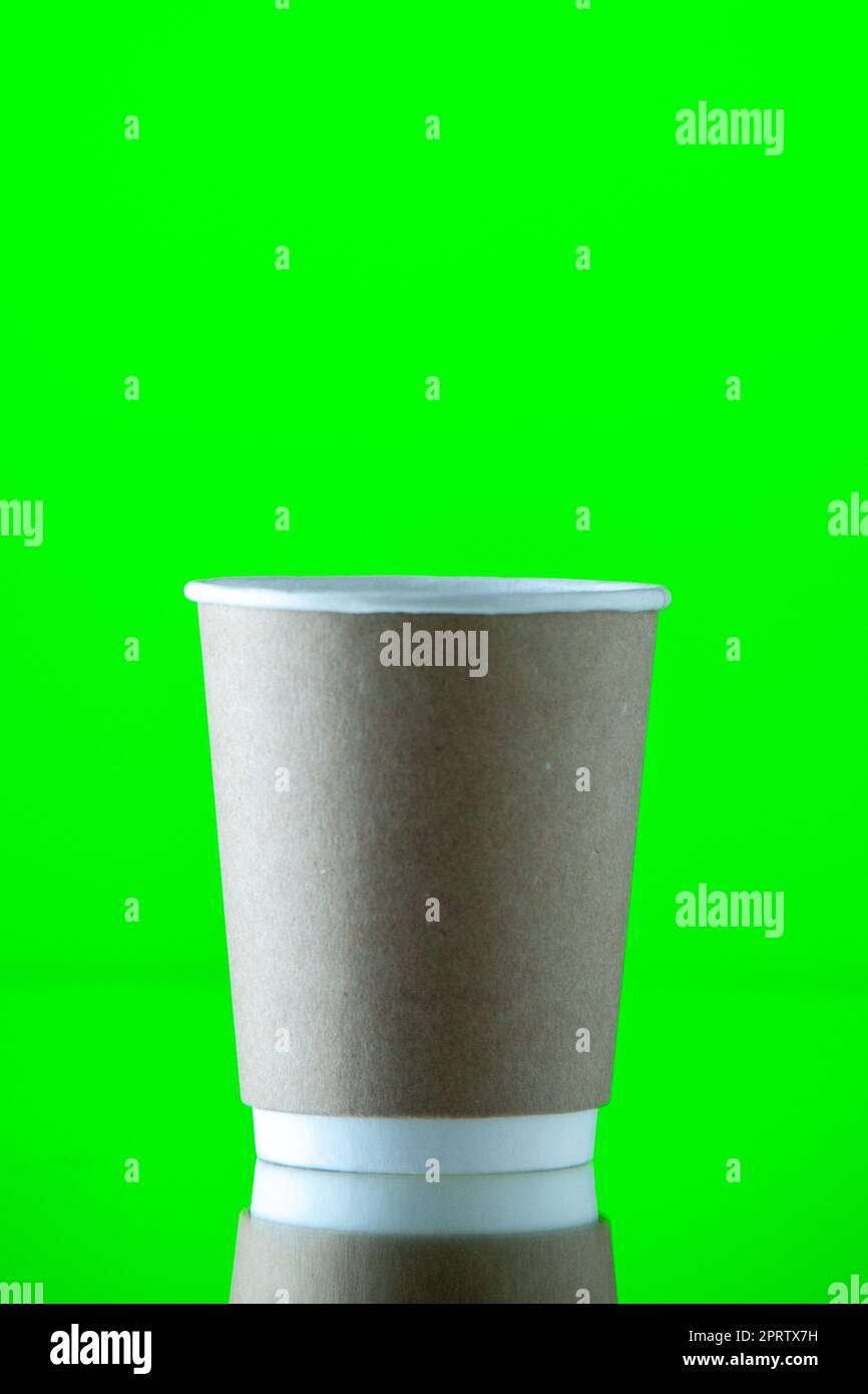 front view paper water cup on neon green background stock photo Stock ...