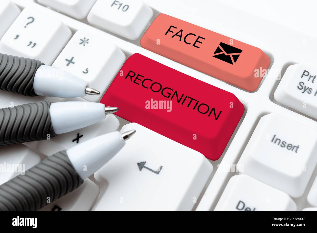 Handwriting text Face Recognition, Word for ability of a computer to scan and recognize human faces Stock Photo