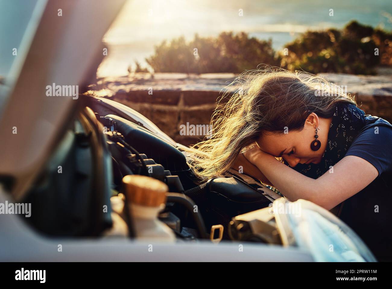 Shes left stranded and in despair. a young woman looking upset after