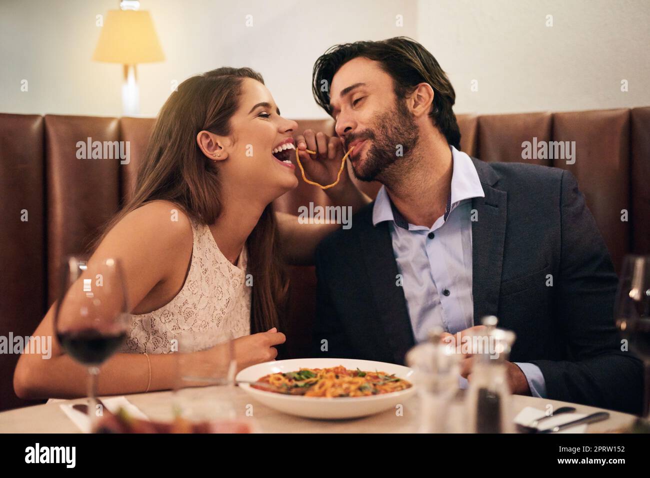 Is this really going to be our first kiss. a young couple sharing