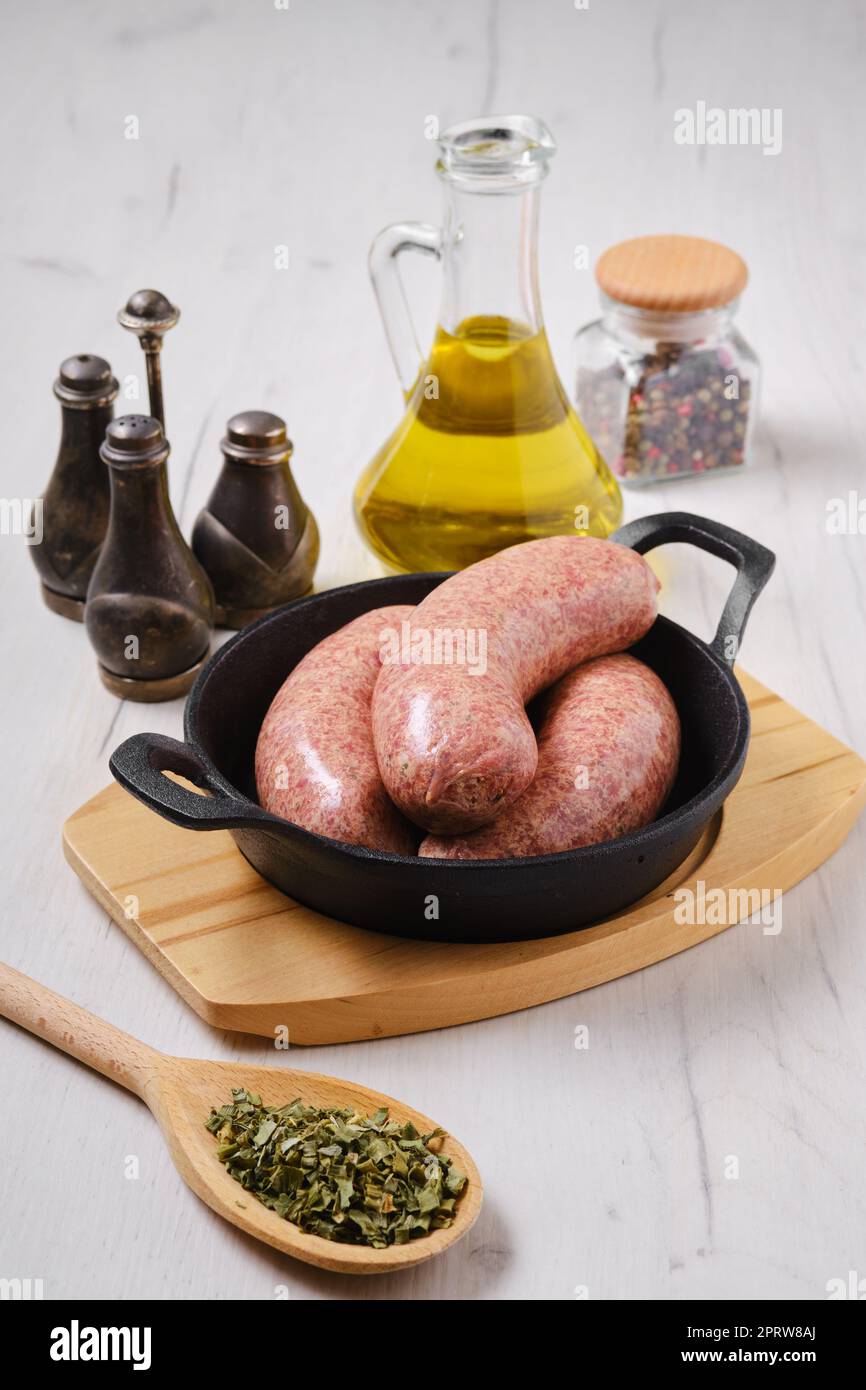 Homemade classic raw beef sausage Stock Photo - Alamy