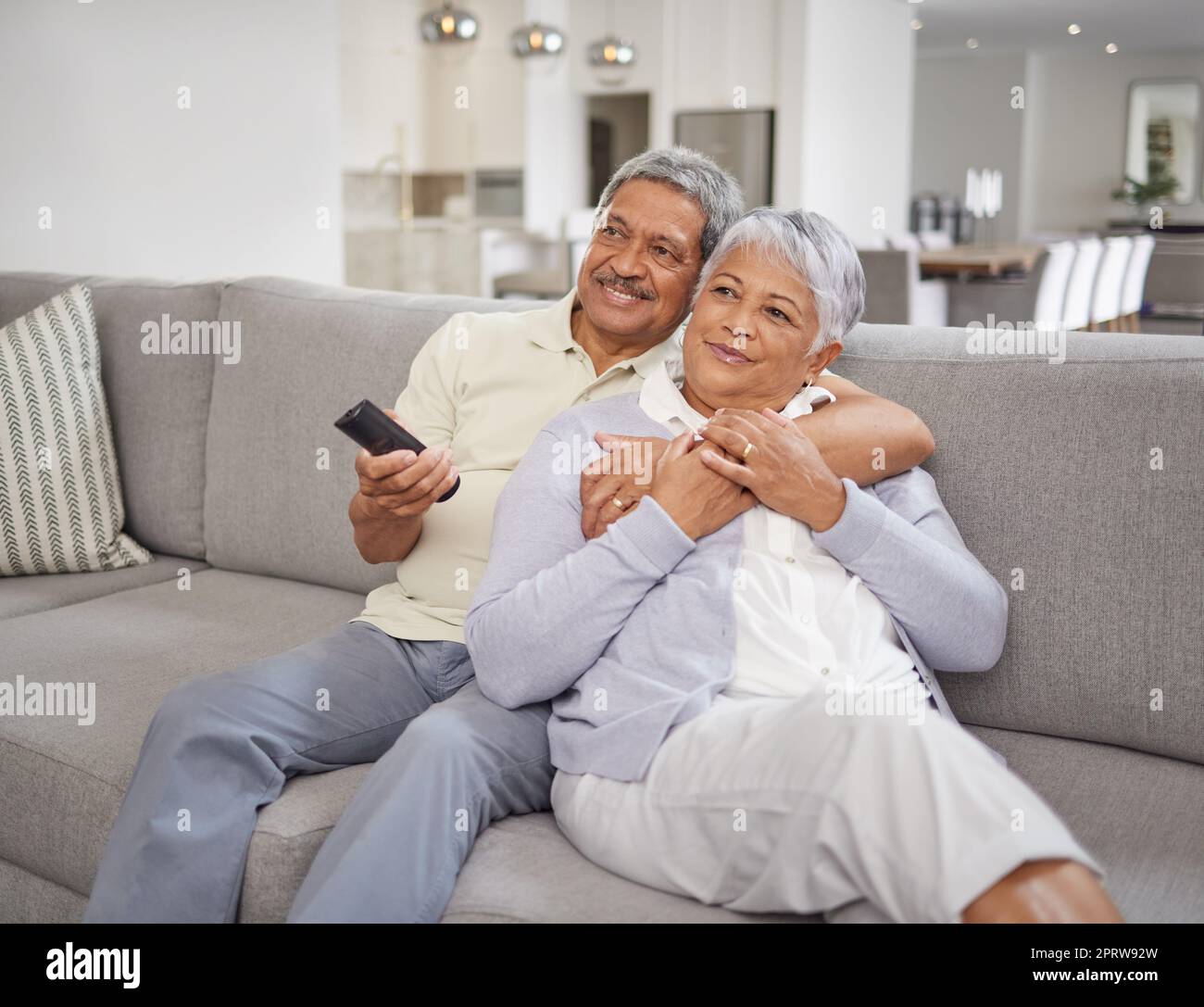 Movie streaming, living room and senior couple at home with quality