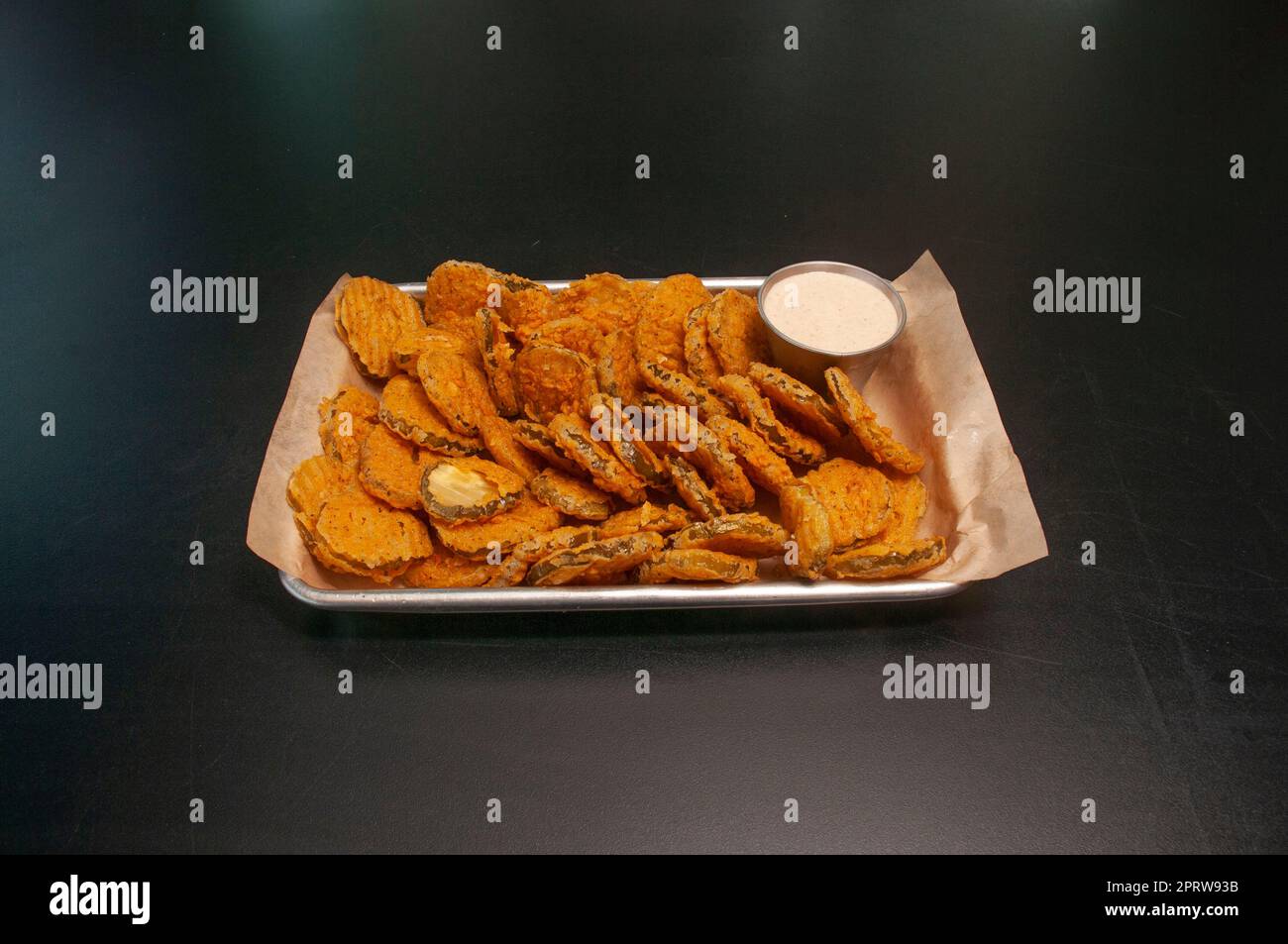 Delicious American dish known as fried pickle chips Stock Photo Alamy