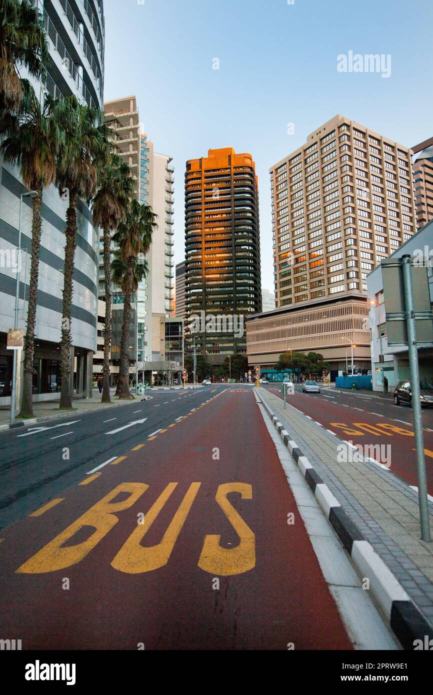 Busses only in this lane. A cropped shot of an empty bus lane in the city. Stock Photo