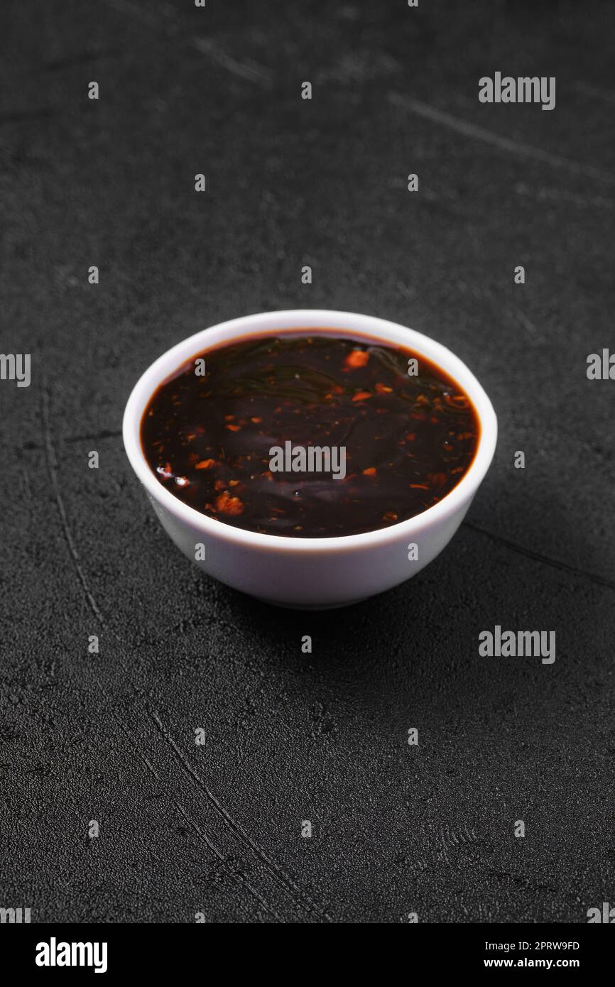 Small bowl with spicy teriyaki sauce Stock Photo
