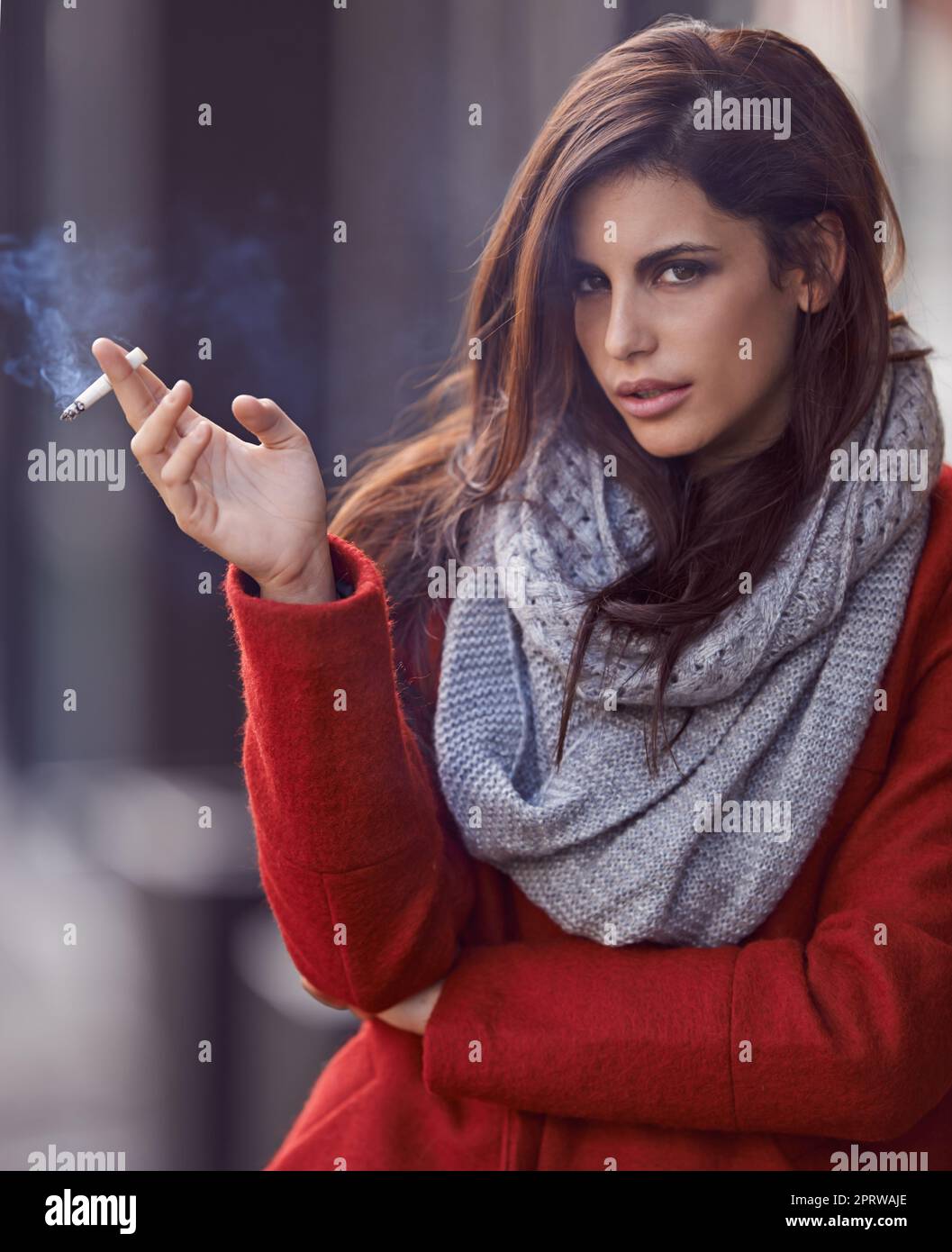 Smoking hot. Portrait of a beautiful and fashionable young woman