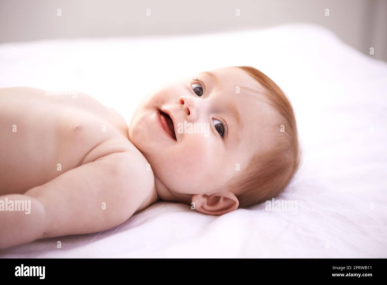 Joy and innocence. an adorable baby girl with red hair. Stock Photo