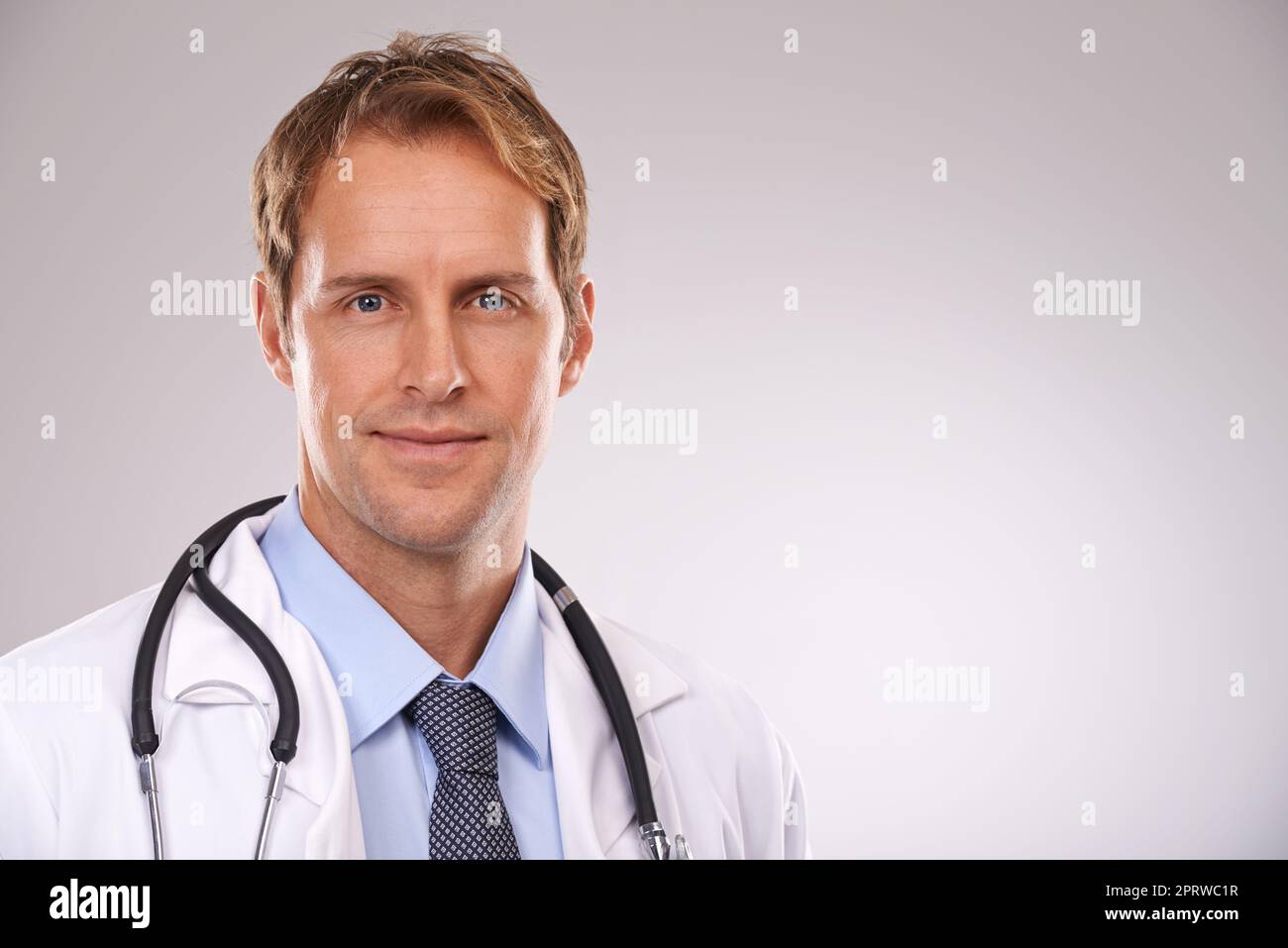 Hes got a face you can trust. Cropped studio portrait of a handsome ...