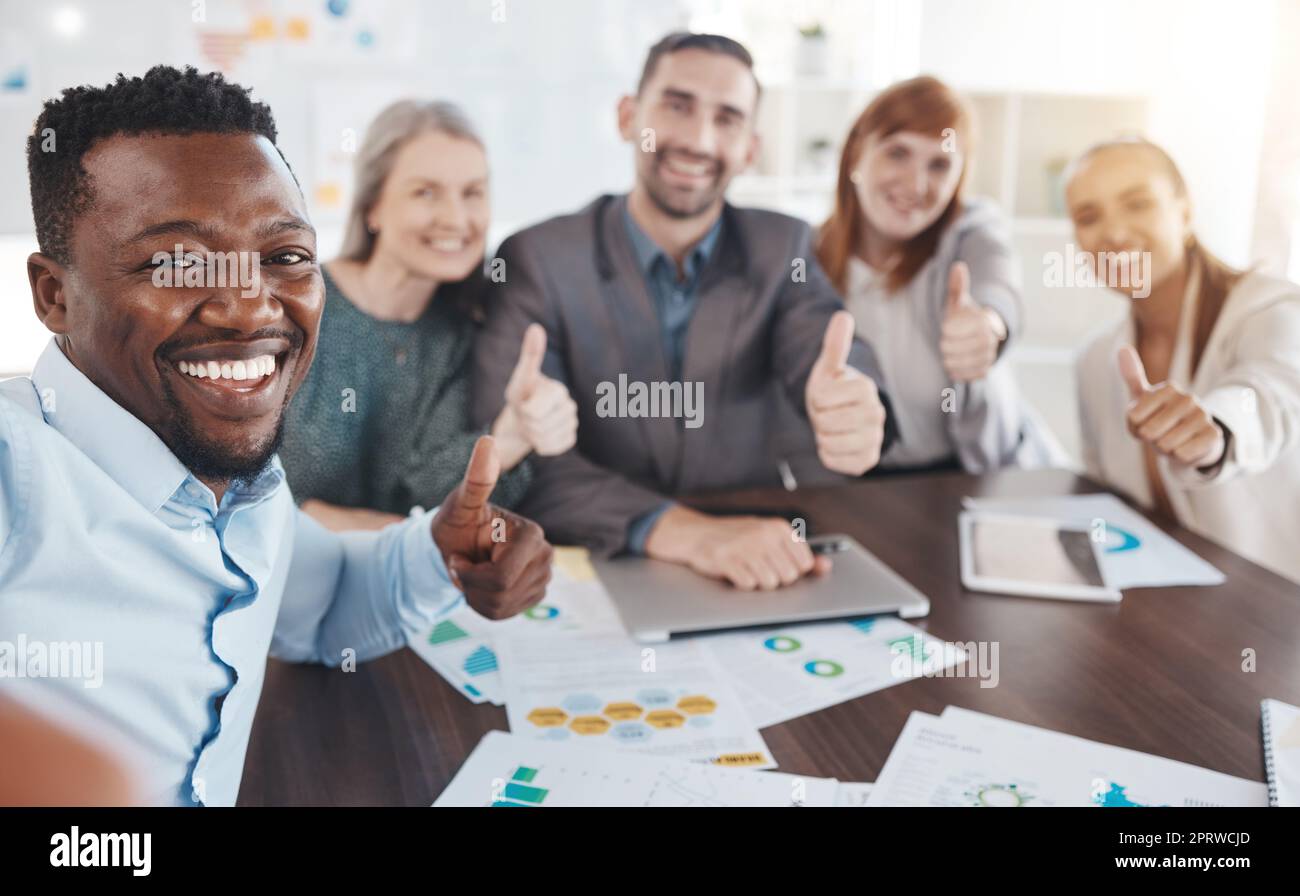 Thumbs up, team success and diversity of office employee team happy and motivation of teamwork. Thank you, winner and yes hand sign of business workers smile doing a collaboration and corporate goal Stock Photo
