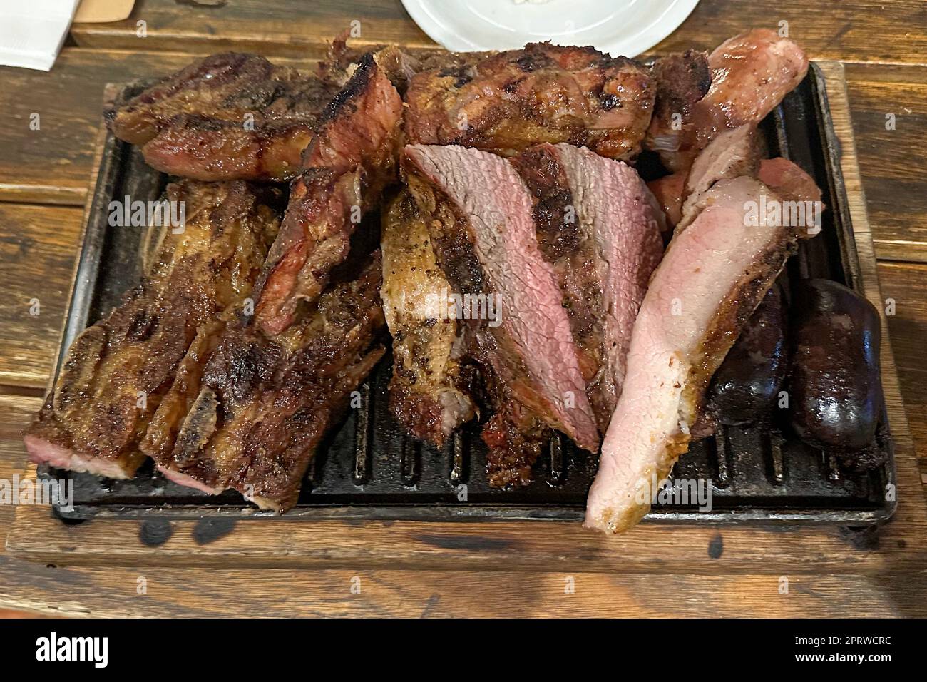 A platter of grilled meats in a parrilla restaurant in Mendoza