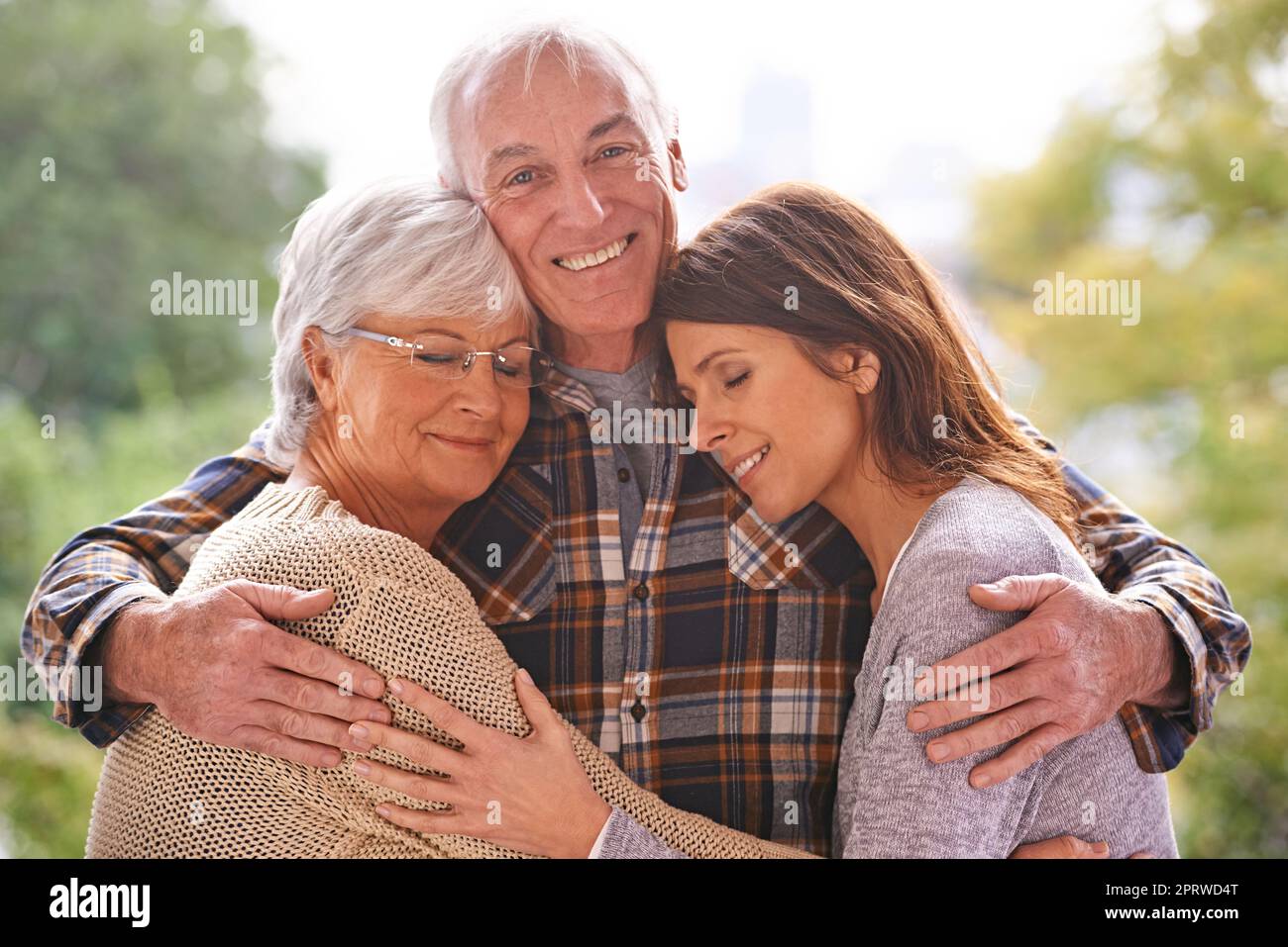 My family is my joy. A cropped portrait of a happy senior couple and their adult daughter at home. Stock Photo