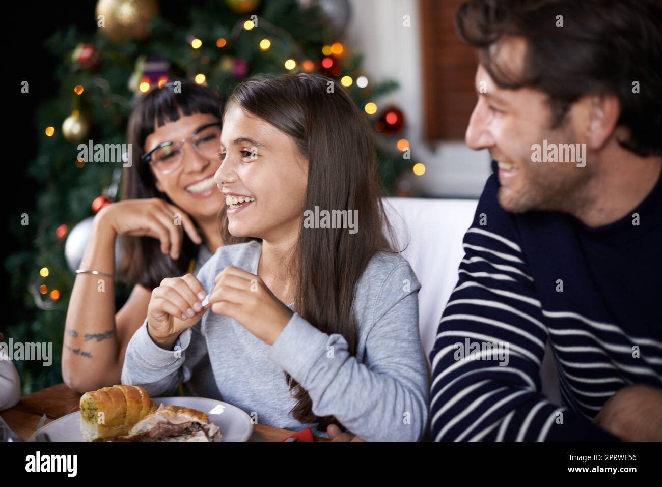 My joke was the funniest. a little girl proud of the joke she told. Stock Photo