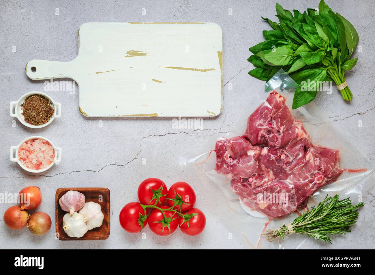 Vacuum sealed meat with ingredients Stock Photo