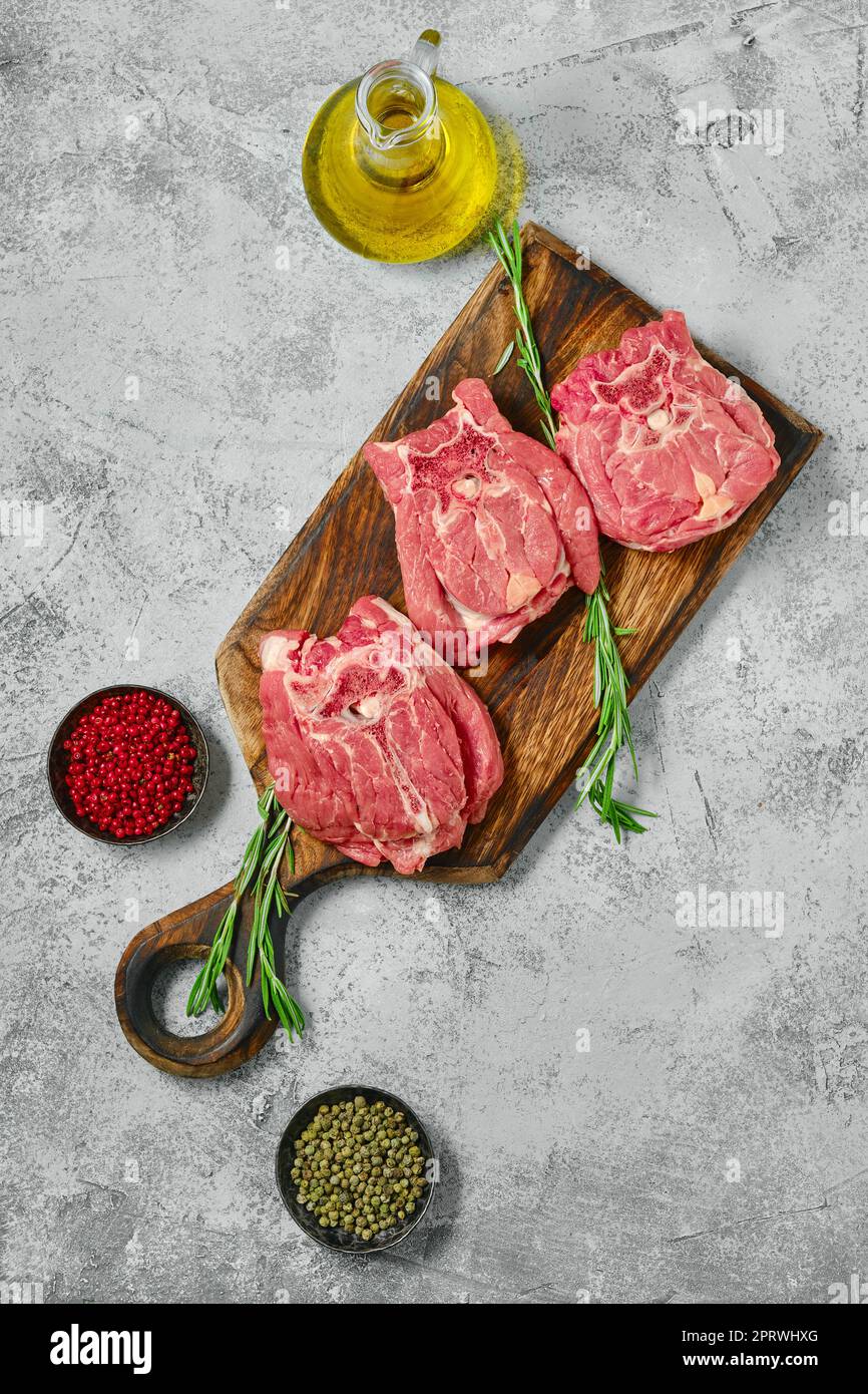 Raw lamb neck cut on slices on cutting board Stock Photo