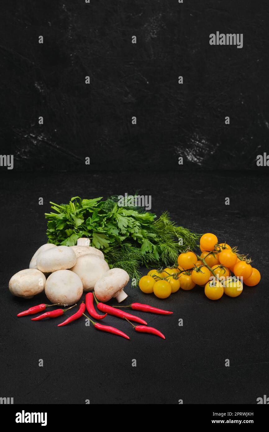 Fresh vegetables on black background Stock Photo