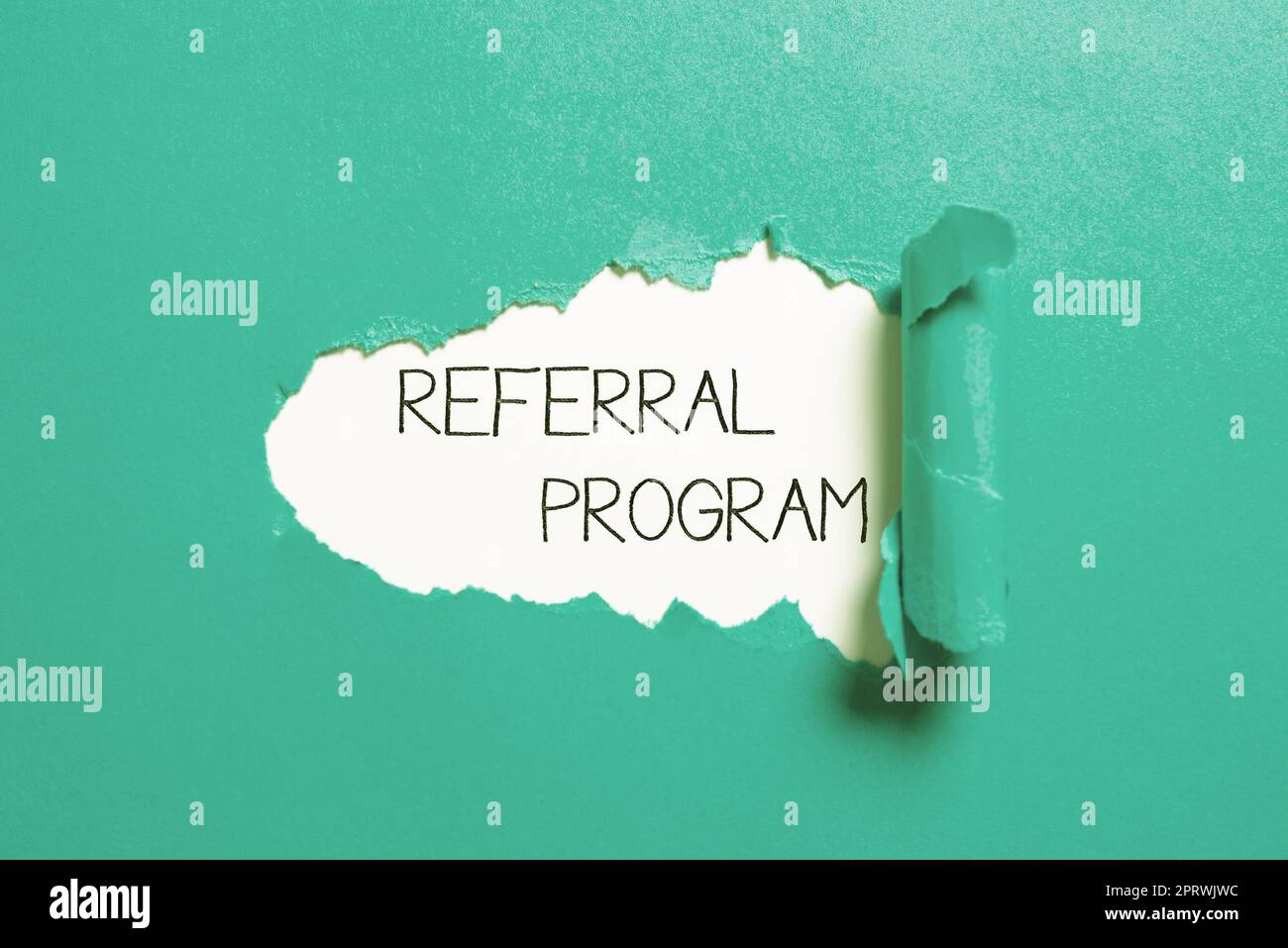 Text sign showing Referral Program, Business idea parking spaces that are reserved for specific individuals Stock Photo